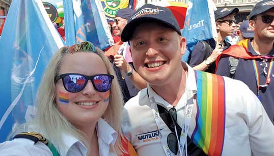 Nautilus Council member Sam Belfitt and international organiser Danny McGowan at a pre-pandemic Pride in London march. Image:Nautilus Council member Sam Belfitt and international organiser Danny McGowan at a pre-pandemic Pride in London march.