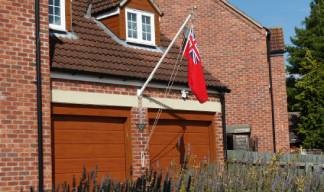 Image:Nautilus retired member Ian Burrell, a former hotel manager/director who served with Cunard, and on QE2 during the Falklands campaign, flew the Red Ensign at his home in rural South Lincolnshire during a quiet respectful recognition of the day. Image: Mr Burrell.