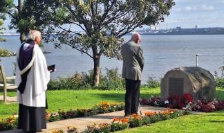 Image:Nautilus Mariners' Park: Wreath-laying at the Atlantic Stone outside the Trinity House Hub, where a MND service was held as well as one in the Nautilus Care Home. Image: Nautilus International