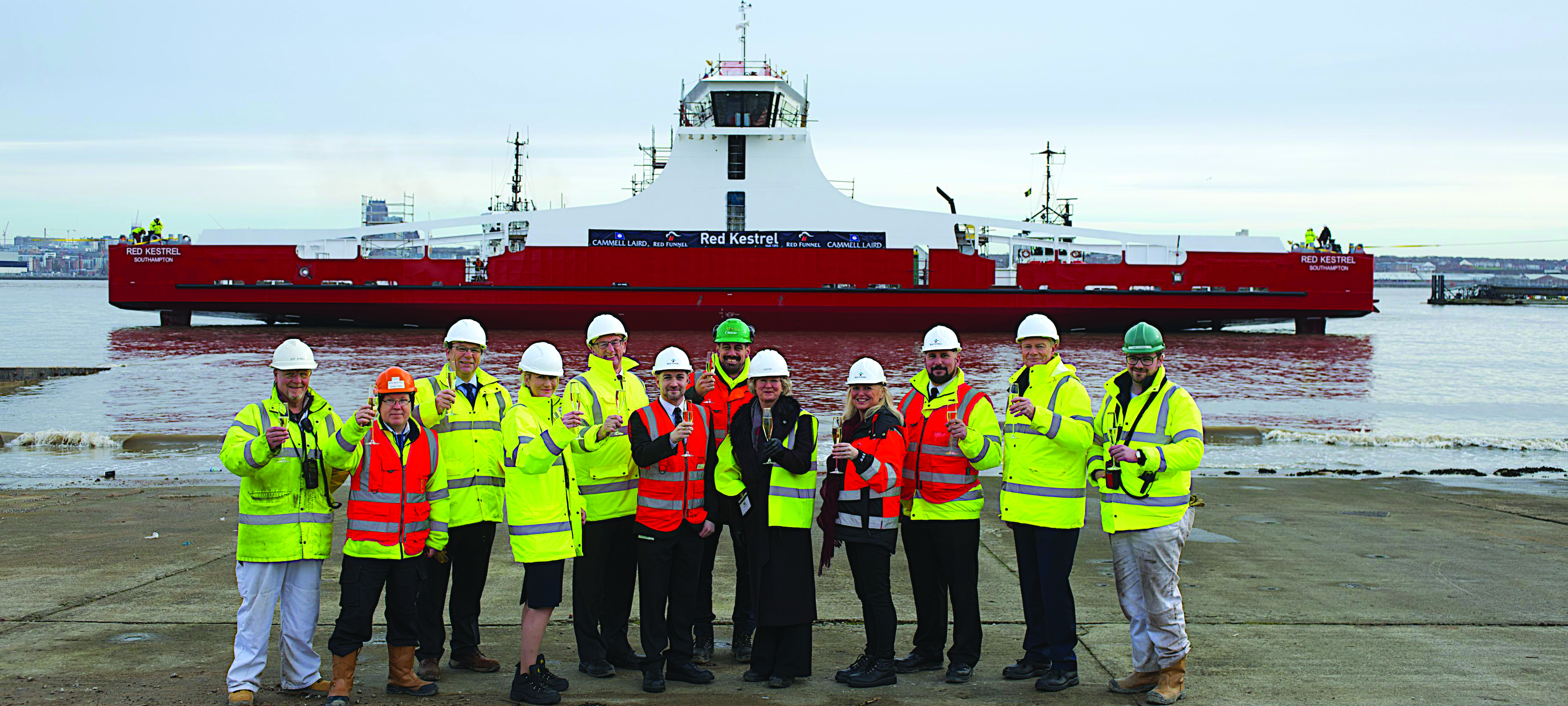 Pictured, left to right, at Red Kestrel’s float-off, are: Jeff Jones (Cammell Laird); Aidan Bannon (Red Funnel); Sean Chambers (RF); Fran Collins (CEO, RF); Mark Slawson (operations director, RF); Lewis Grant (RF); Stuart Bendall (RF); Karen George (ship godmother); Kay Andrews; Captain Ned Tutton; Kevin George (chairman, RF); and Tom Curwell (CL). Image:Pictured, left to right, at Red Kestrel’s float-off, are: Jeff Jones (Cammell Laird); Aidan Bannon (Red Funnel); Sean Chambers (RF); Fran Collins (CEO, RF); Mark Slawson (operations director, RF); Lewis Grant (RF); Stuart Bendall (RF); Karen George (ship godmother); Kay Andrews; Captain Ned Tutton; Kevin George (chairman, RF); and Tom Curwell (CL).